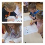 4. Dzieci rozwiązują łamigłówki matematyczne.