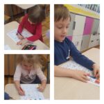 5. Dzieci rozwiązują łamigłówki matematyczne.
